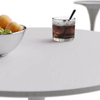 Tavolo da pranzo rotondo piccolo con base in metallo