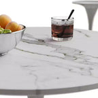 Tavolo da pranzo rotondo piccolo con base in metallo