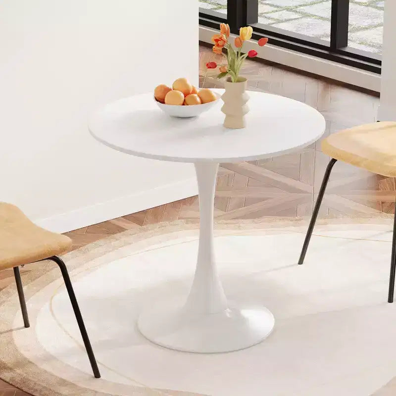Tavolo da pranzo rotondo piccolo con base in metallo